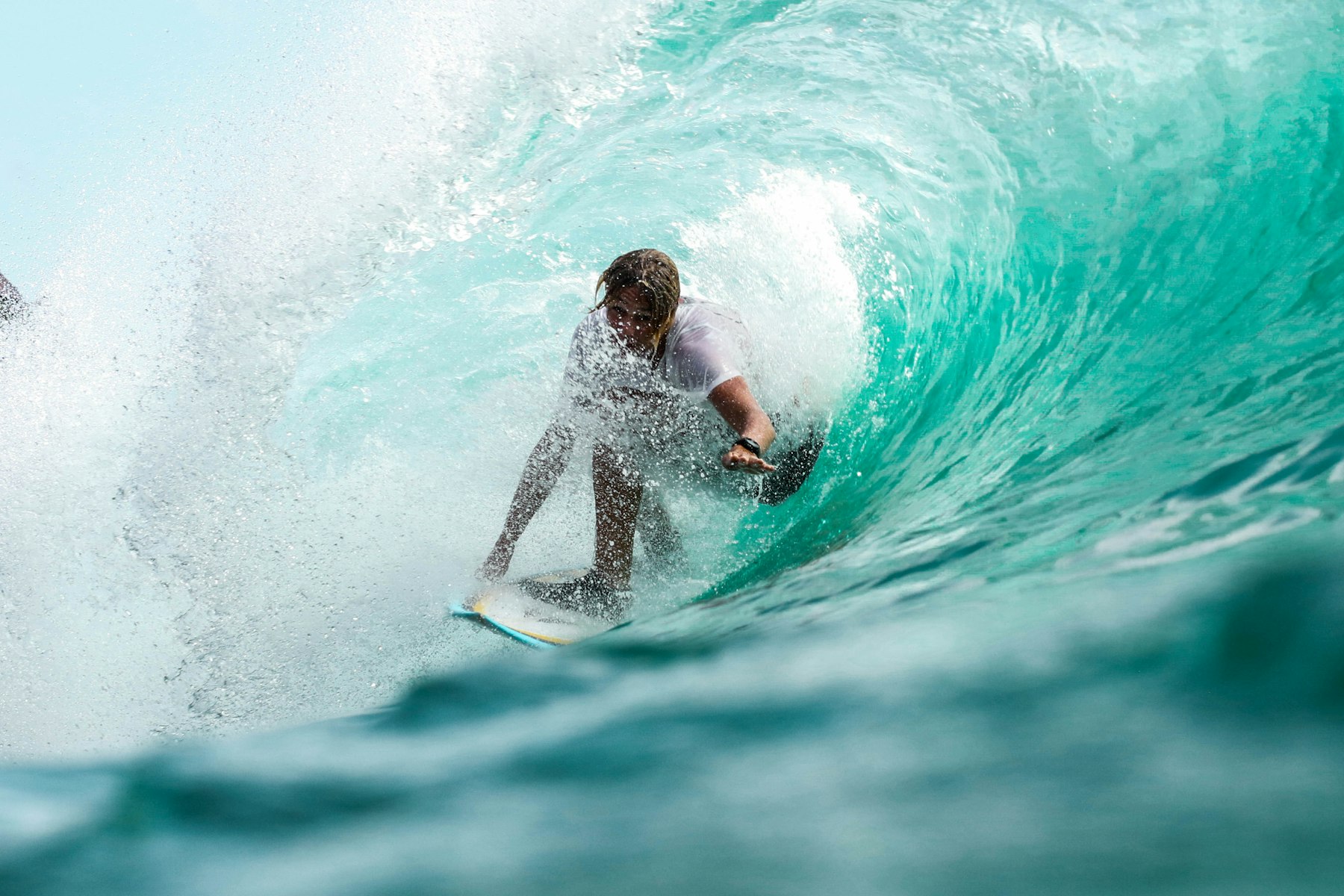 Surfer on a Pacific wave